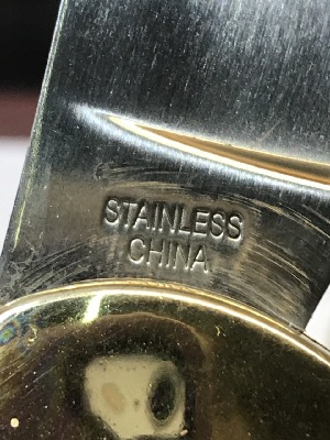 543077