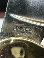 543077