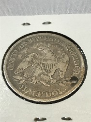 566167