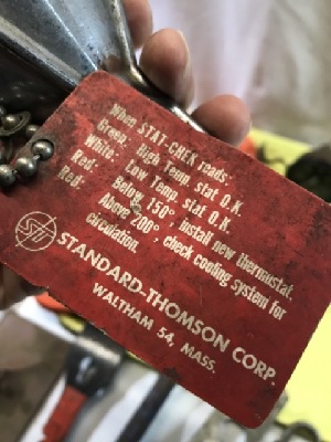 571127
