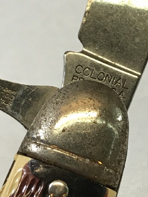 571165