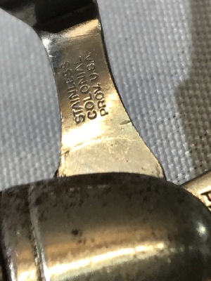 571166