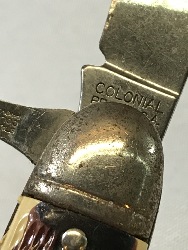 571165